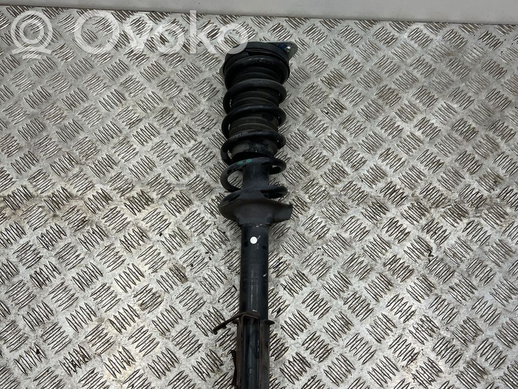 Dacia Spring Front shock absorber with coil spring 