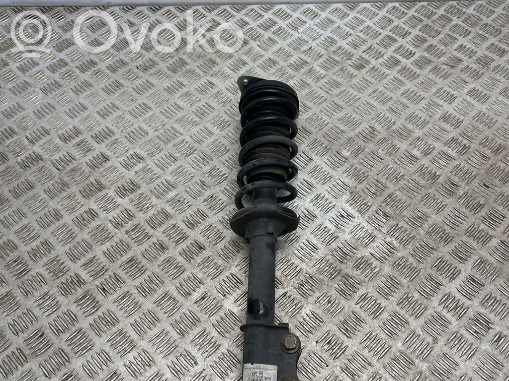 Dacia Spring Front shock absorber with coil spring 