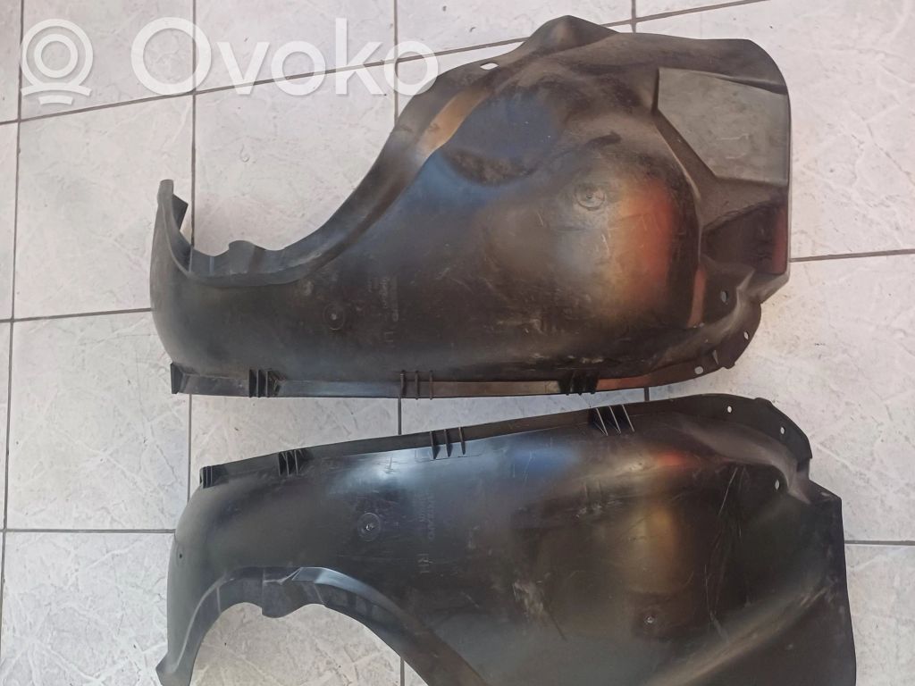 Front wheel arch liner splash guards