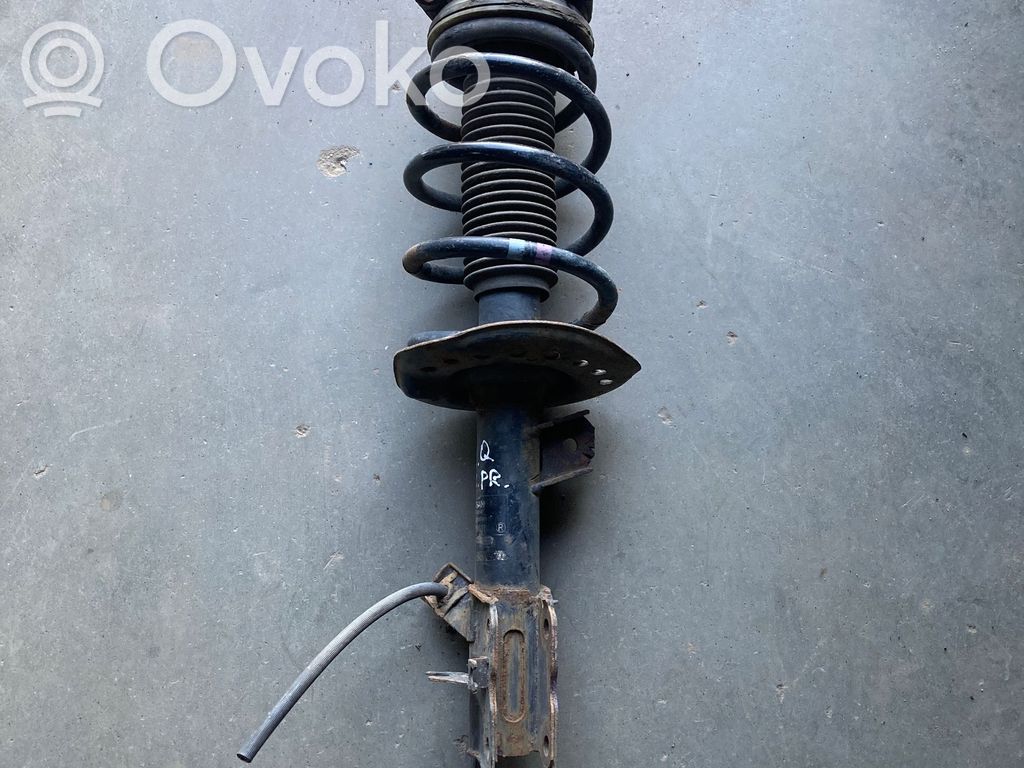 Nissan Qashqai+2 Amortyzator osi przedniej ze sprężyną 
