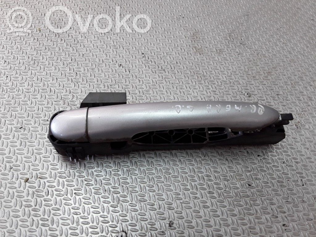 Nissan Primera Manecilla externa puerta trasera 