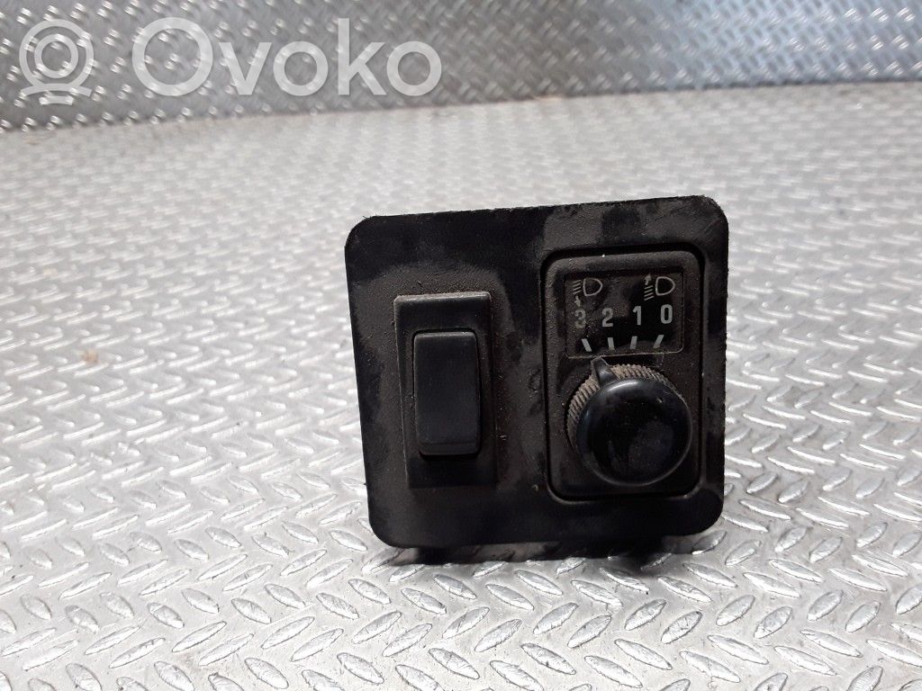 Headlight level height control switch