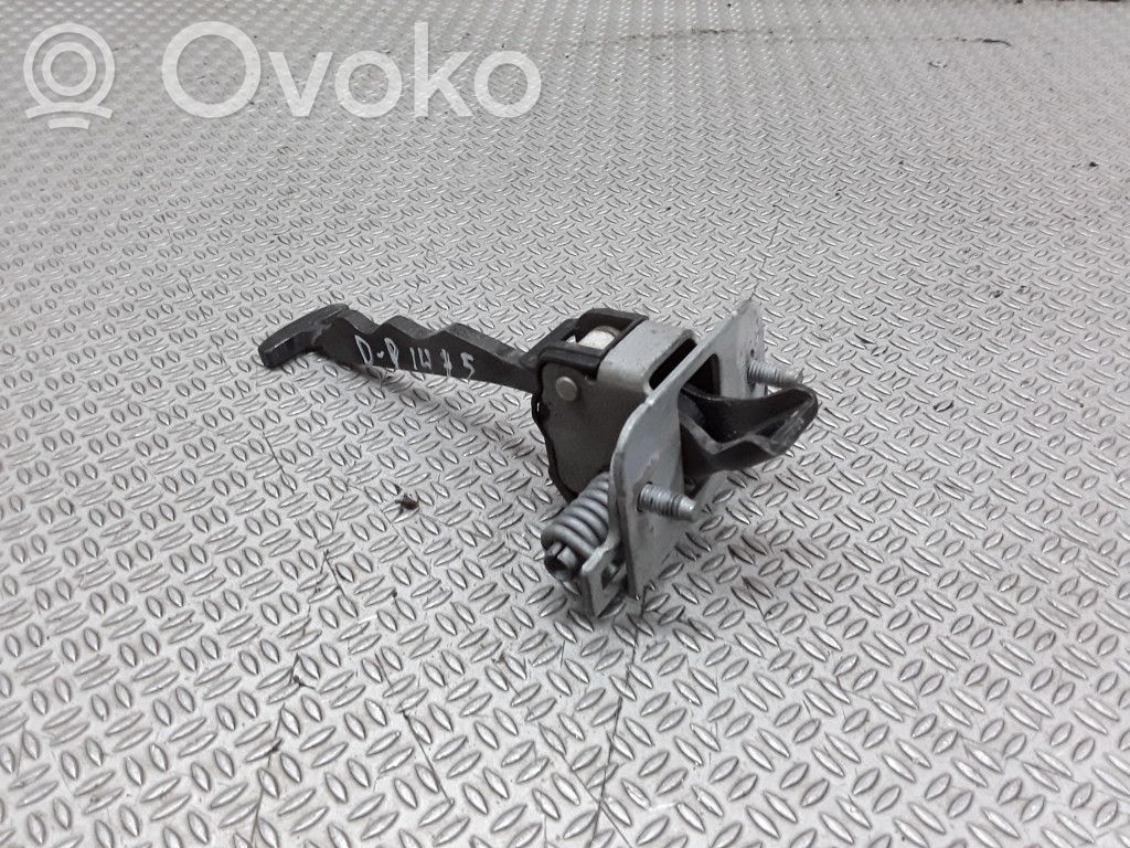 Front door check strap stopper