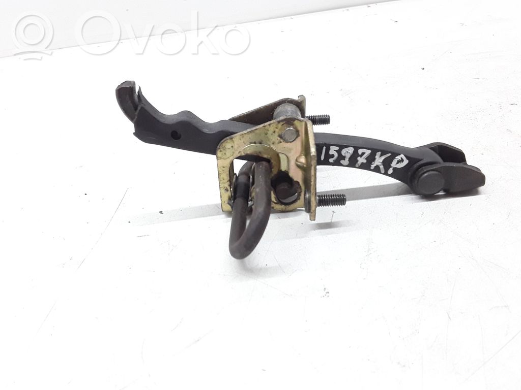 Front door check strap stopper
