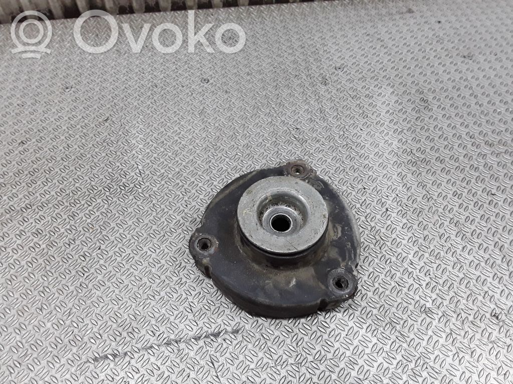Front coil spring rubber mount