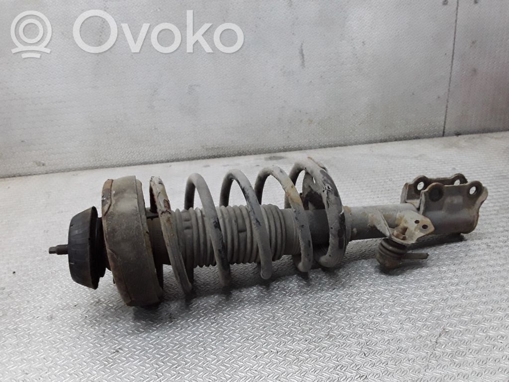 Front shock absorber with coil spring