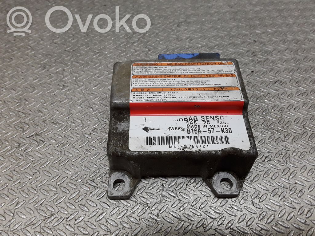 Mazda 323 F Airbag control unit/module 