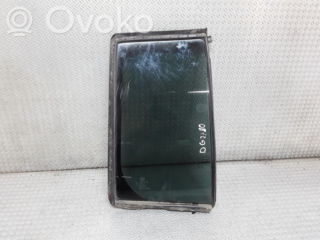 Rear vent window glass