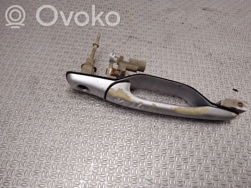 Mitsubishi Grandis Manecilla externa puerta delantera 