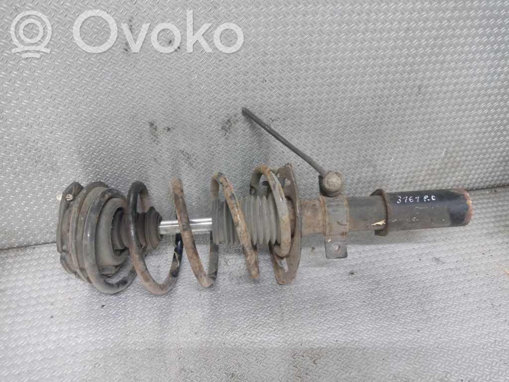 Front shock absorber with coil spring