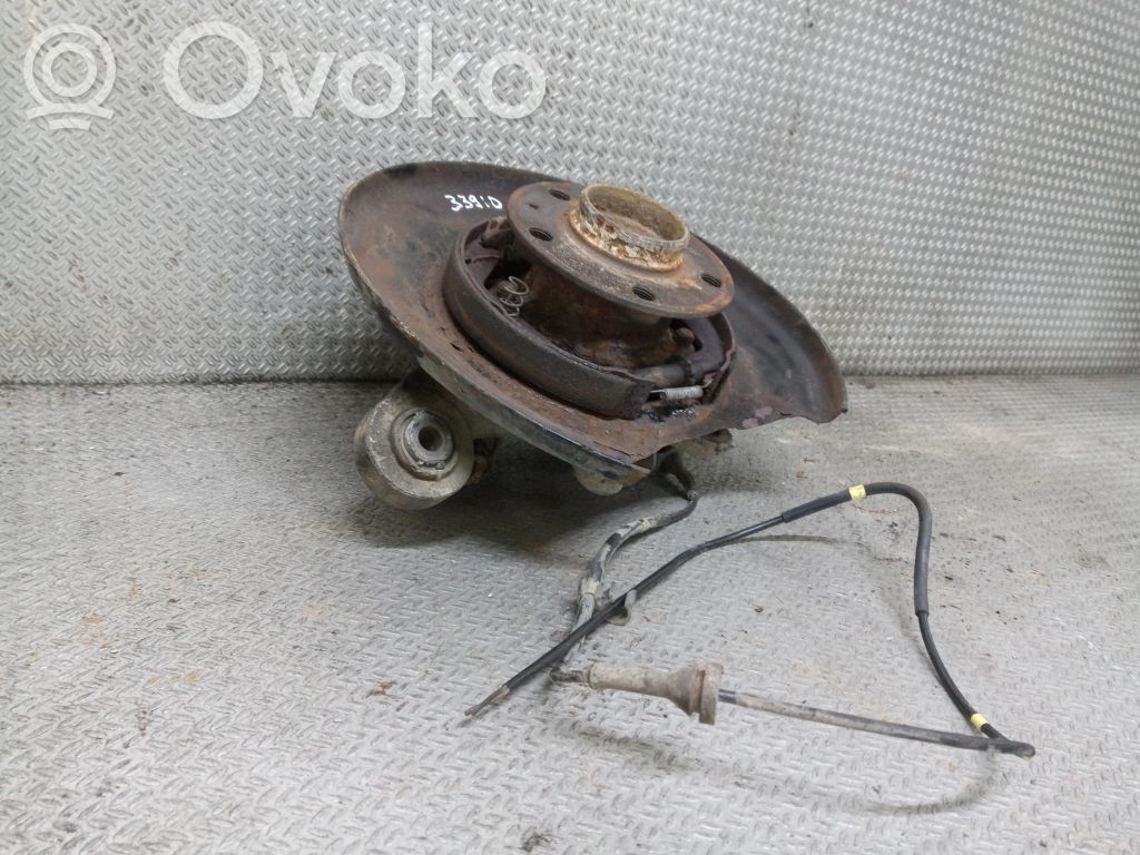 Rear wheel hub spindle/knuckle