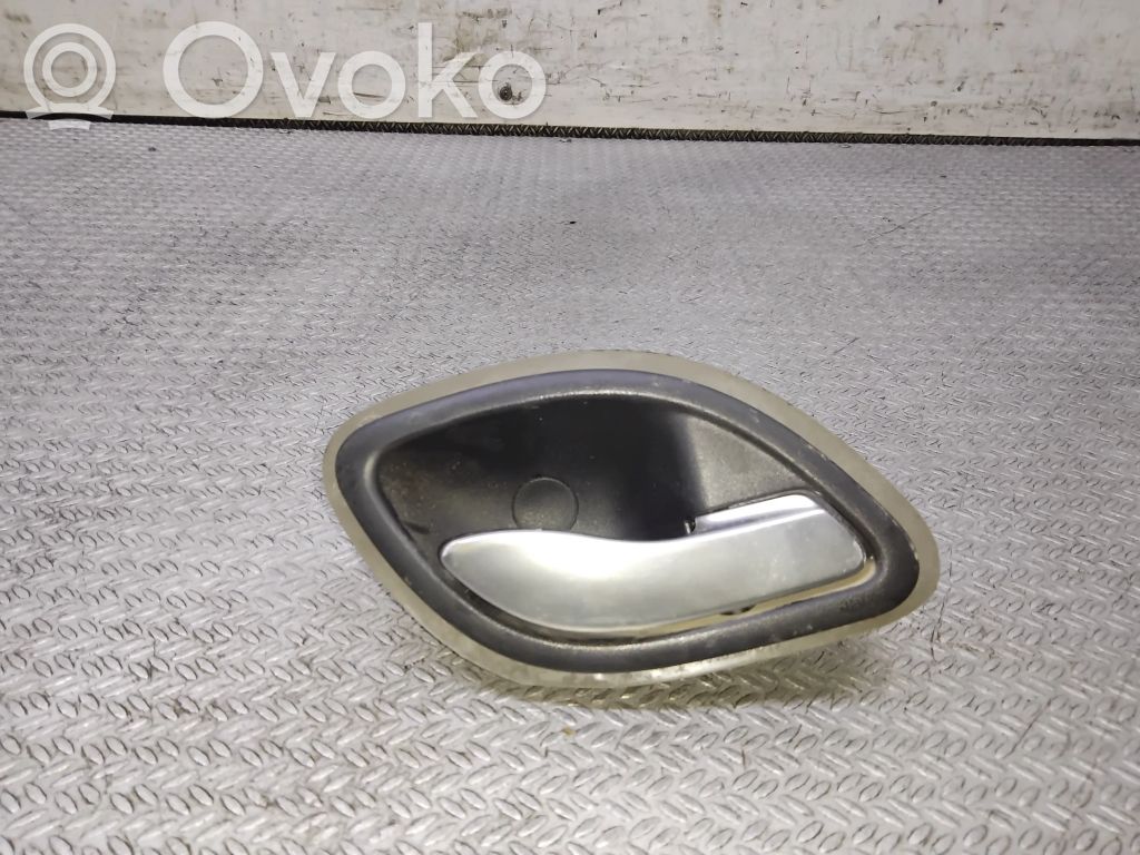 Manecilla interna puerta trasera   98007101