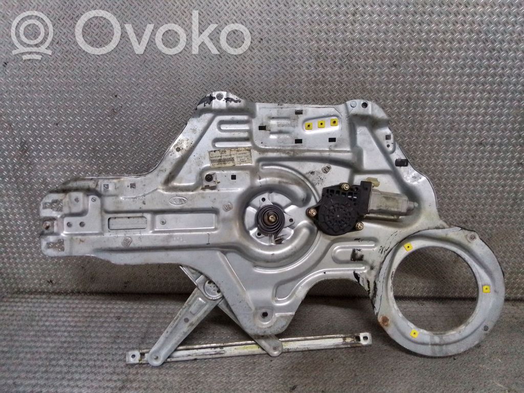 KIA Cerato Elektryczny podnośnik szyby drzwi przednich 