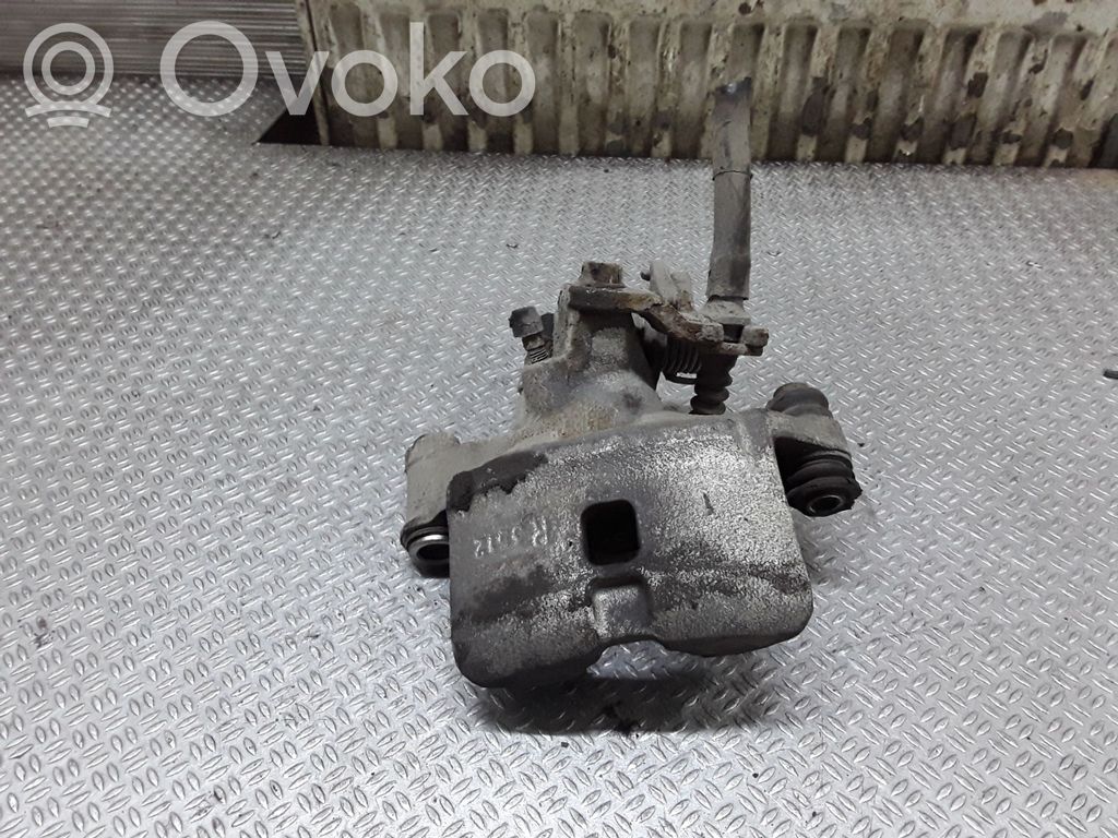 Toyota Corolla E110 Pinza del freno posteriore