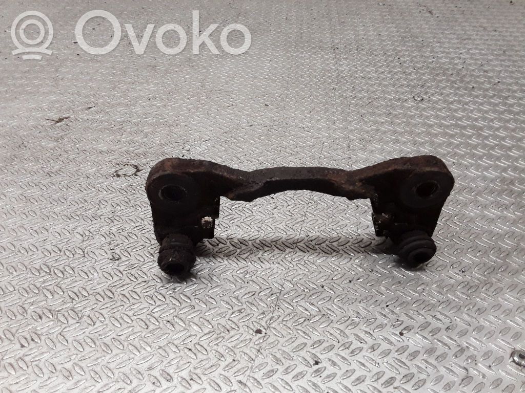 Mocowanie / Zacisk hamulca tylnego