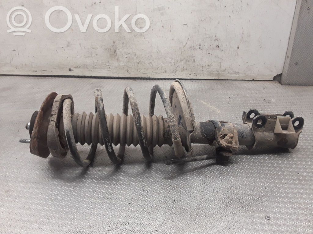 Front shock absorber with coil spring