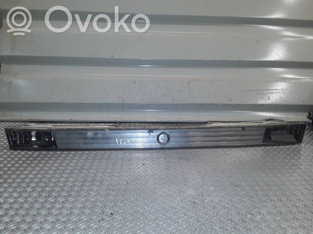 Trunk door license plate light bar   6908711