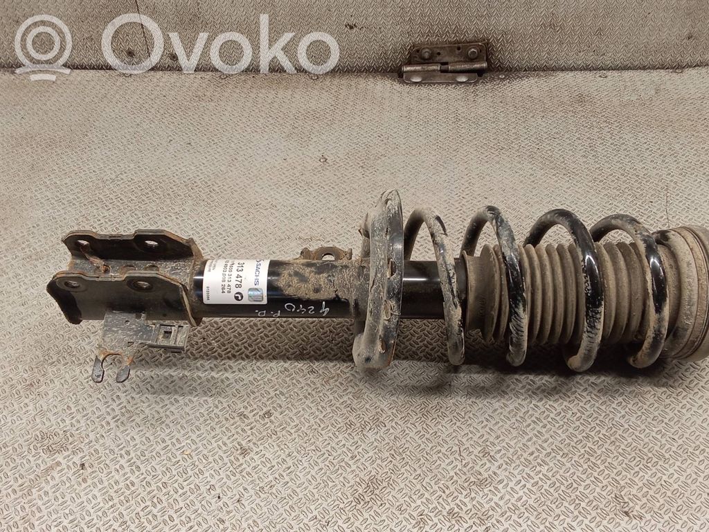 Front shock absorber with coil spring