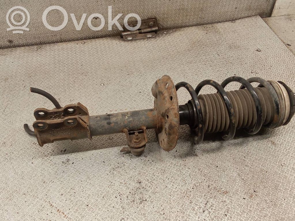 Opel Corsa D Front shock absorber with coil spring 