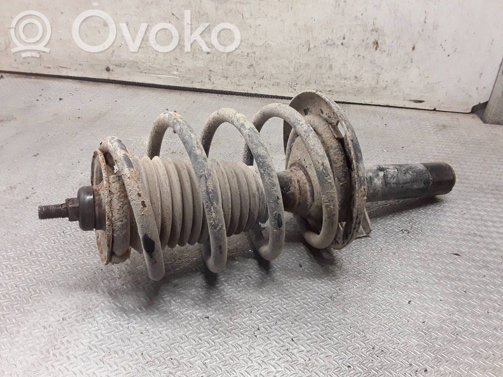Front shock absorber with coil spring