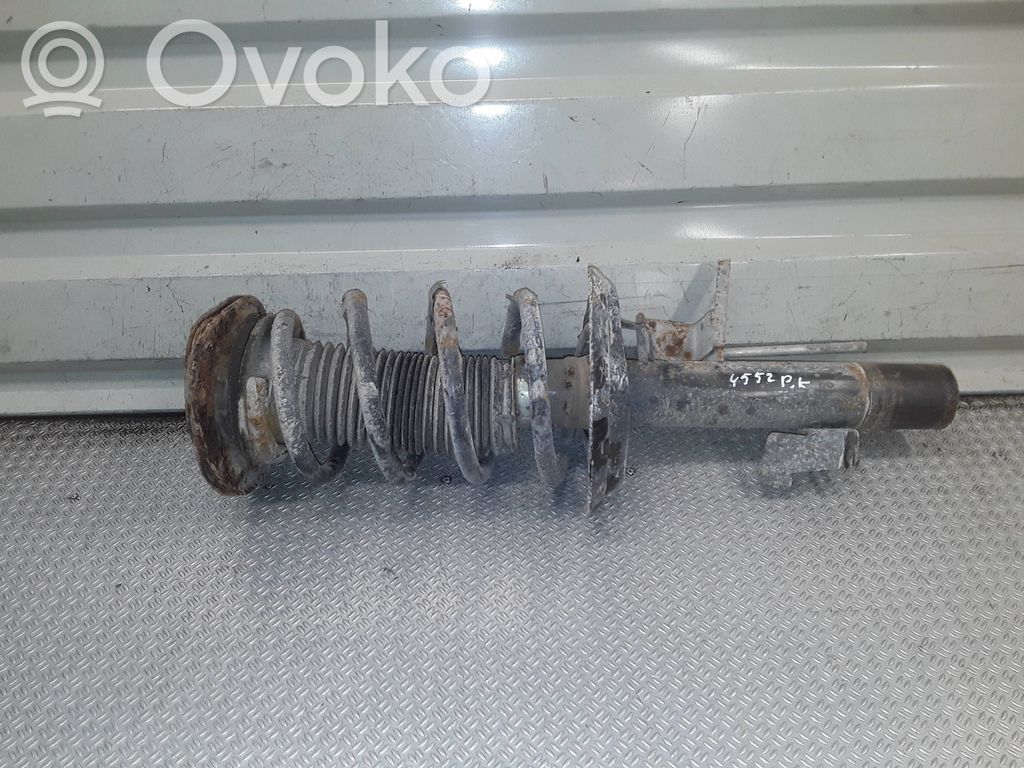 Front shock absorber with coil spring