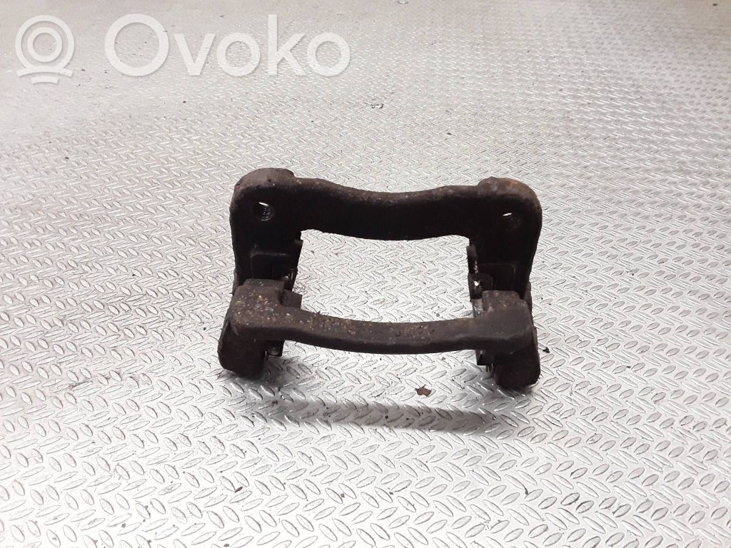 Mocowanie / Zacisk hamulca tylnego