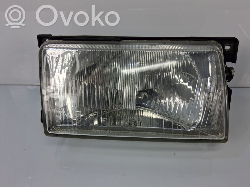 Volkswagen Polo II 86C 2F Lampa przednia 