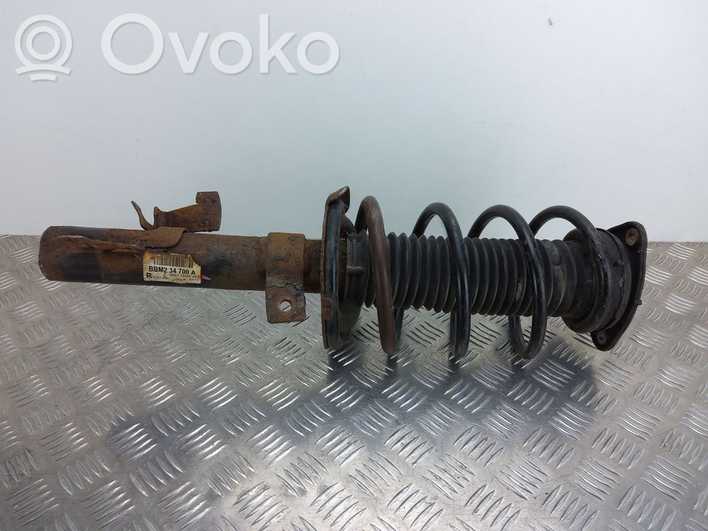 Mazda 3 II Front shock absorber with coil spring 