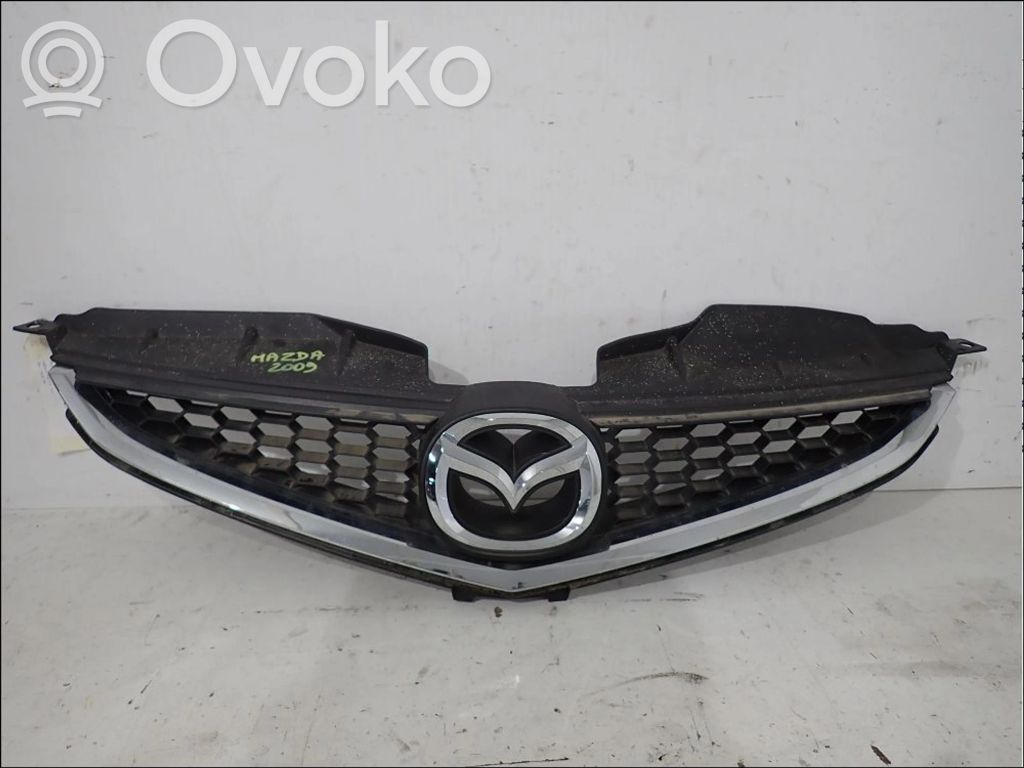 Mazda 5 Front bumper upper radiator grill 