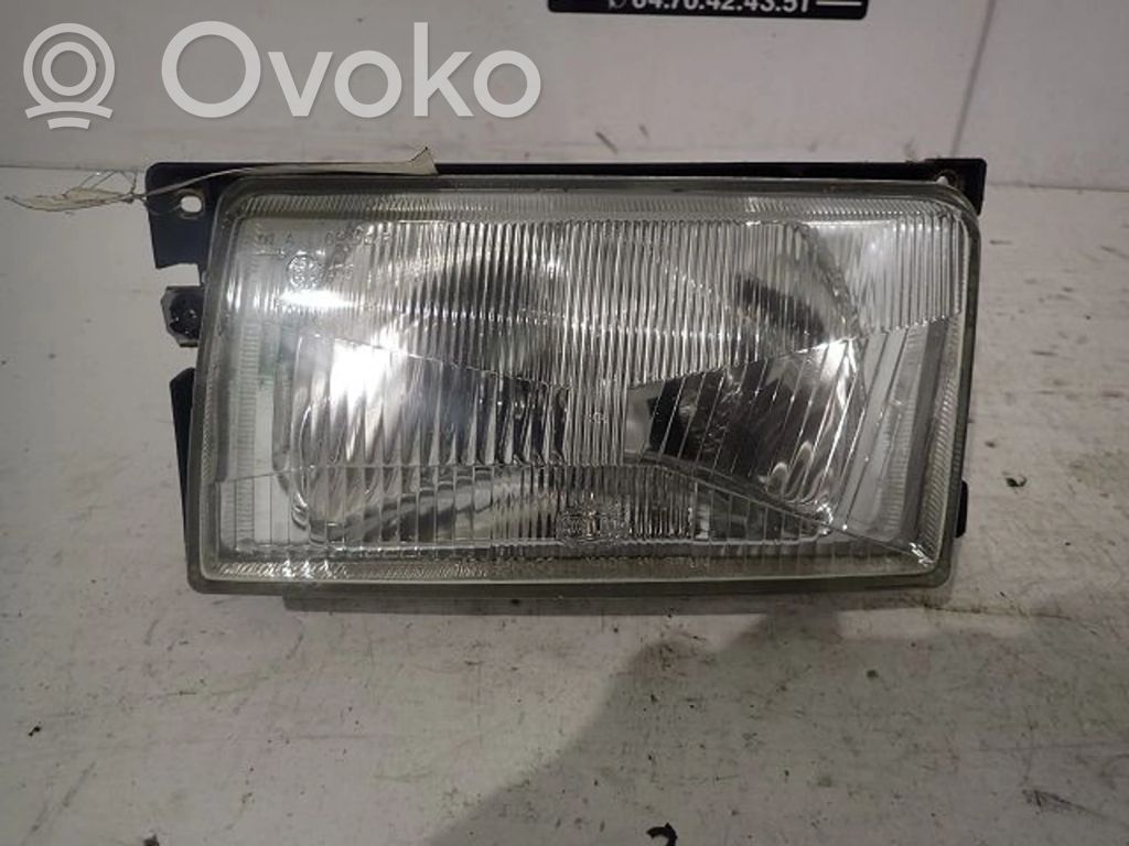 Volkswagen Polo II 86C 2F Lampa przednia 
