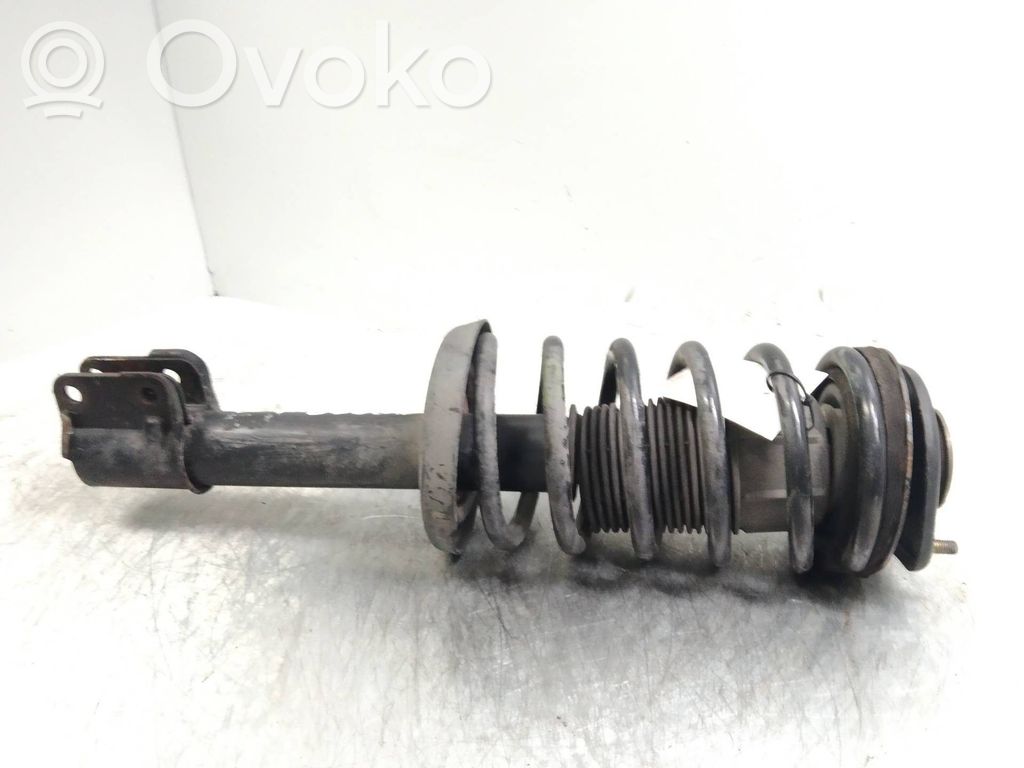 Front shock absorber with coil spring