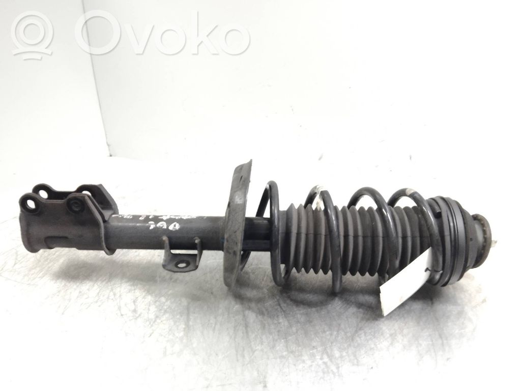 Opel Corsa D Front shock absorber with coil spring 