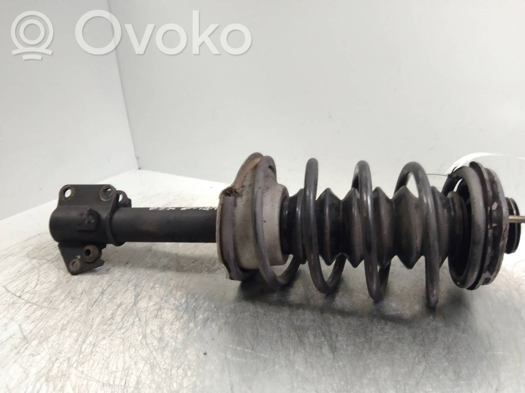 Front shock absorber with coil spring