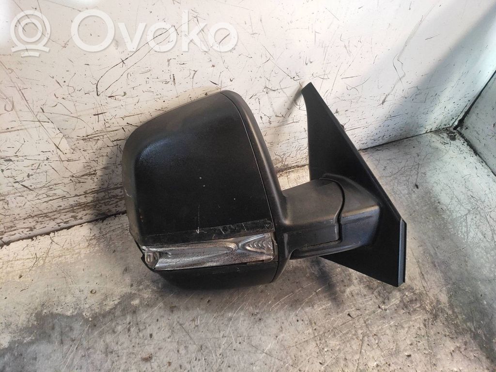 Front door electric wing mirror