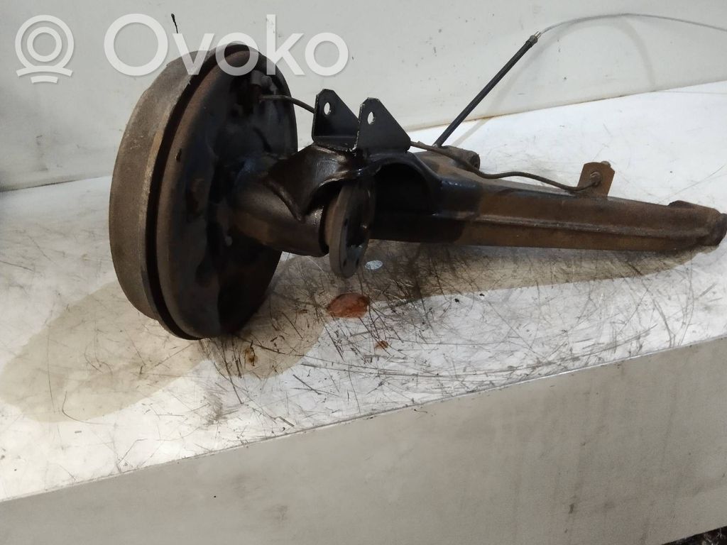Rear wheel hub spindle/knuckle