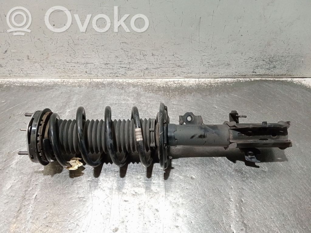 Ford Puma Front shock absorber with coil spring 