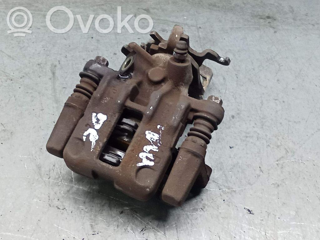 Nissan Almera N16 Mocowanie / Zacisk hamulca tylnego
