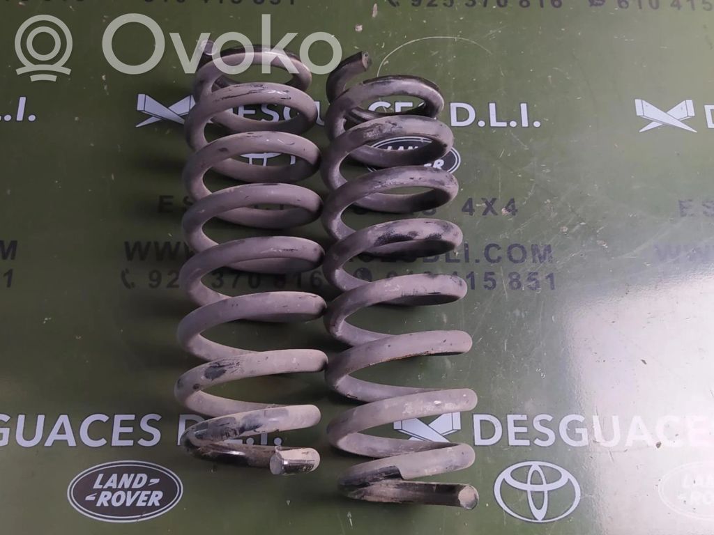Front shock absorber with coil spring
