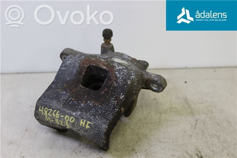Mazda 323 Front brake caliper 