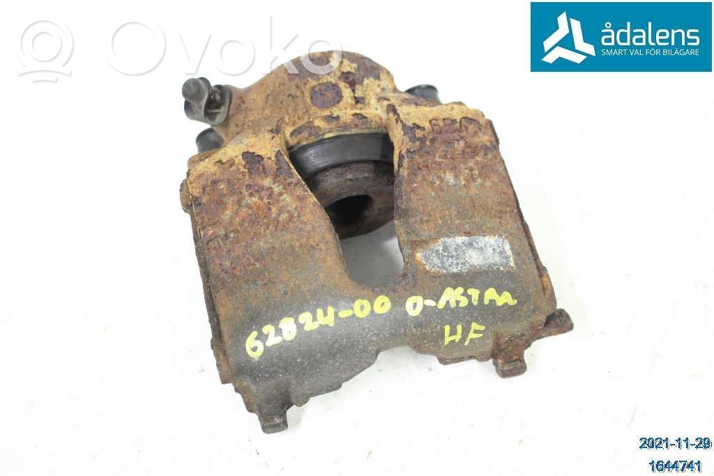 Opel Astra G Zacisk hamulcowy przedni 