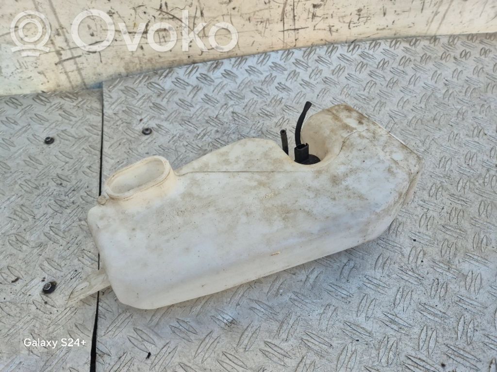 Dacia Sandero Langų skysčio bakelis 