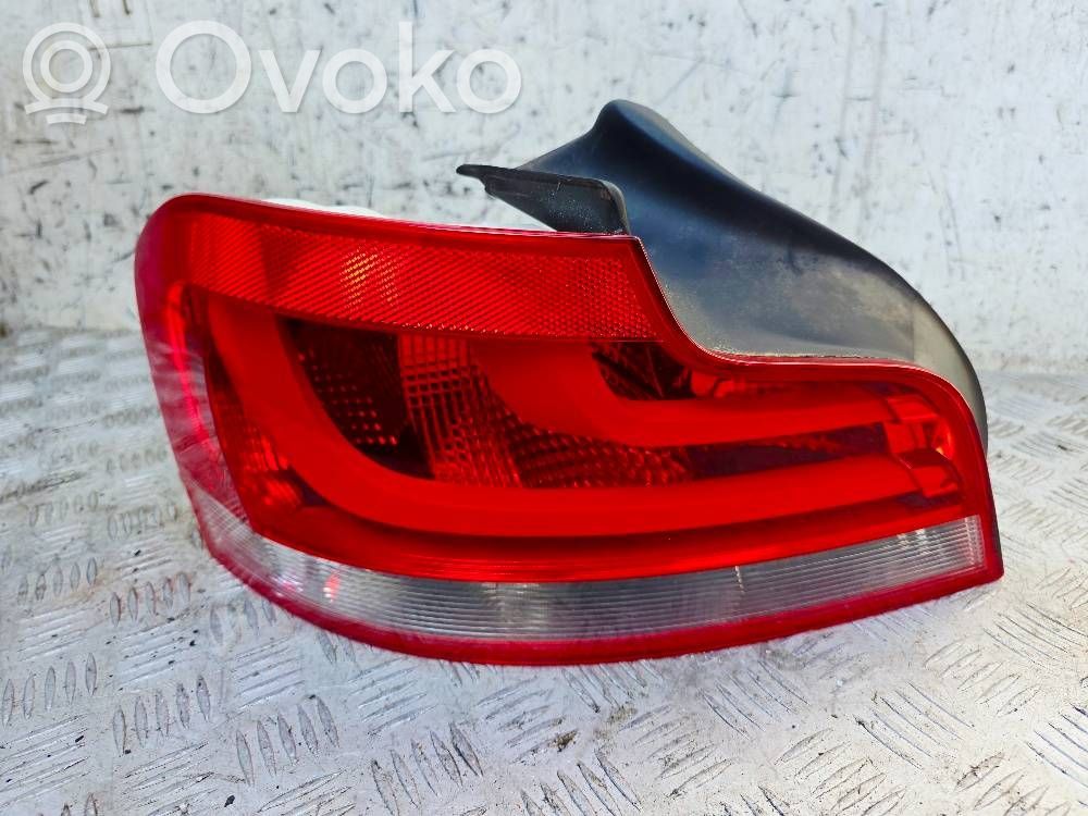 BMW 1 E82 E88 Aizmugurējais lukturis virsbūvē 