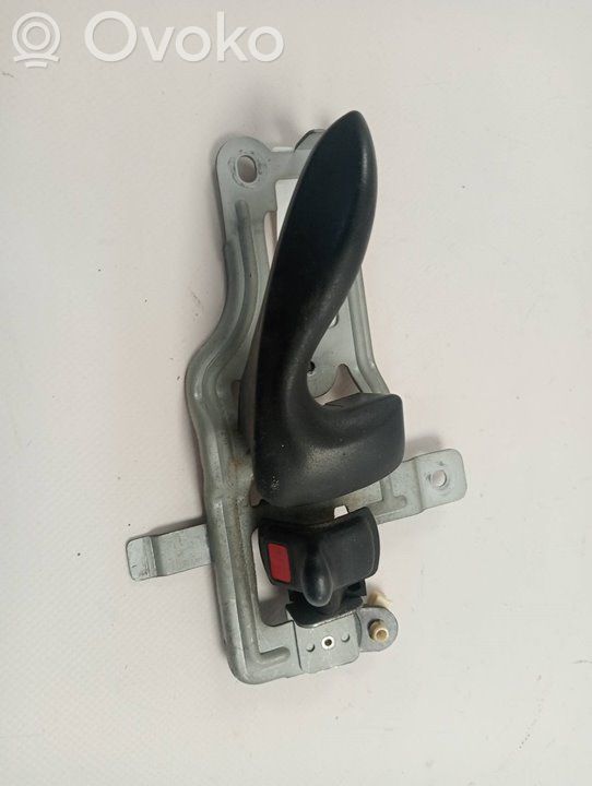 Manecilla interna puerta delantera