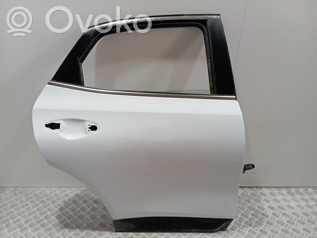 Puerta trasera   77004J7800