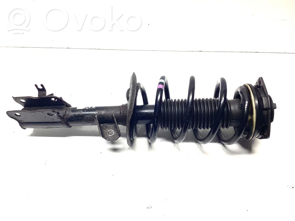 Nissan Qashqai+2 Amortyzator osi przedniej ze sprężyną 