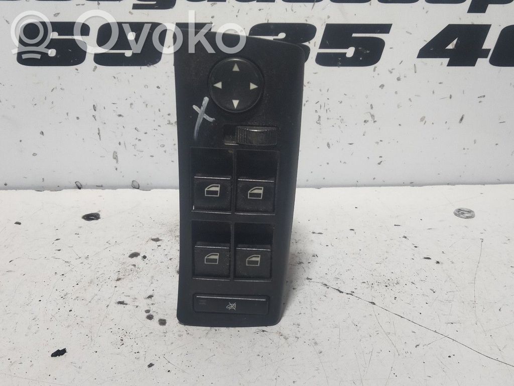 Electric window control switch   6925695