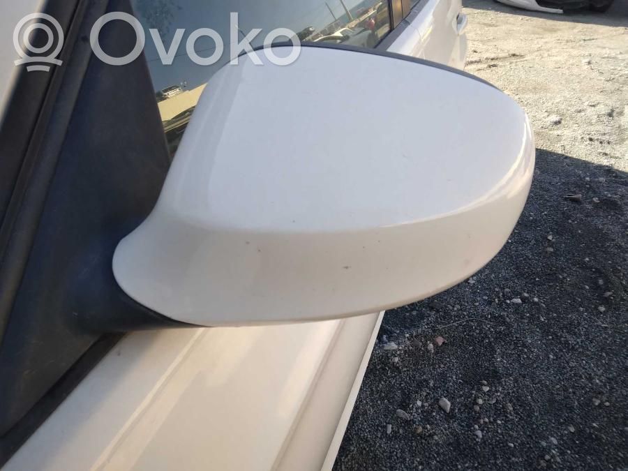 Espejo lateral eléctrico de la puerta delantera   E1021017