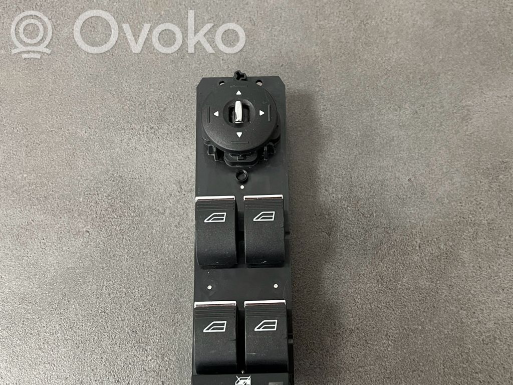 Electric window control switch   AM5T14A132AA