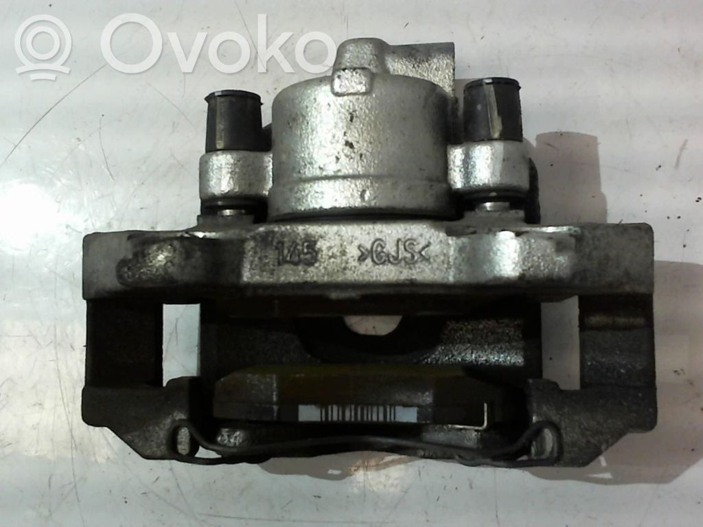 Opel Corsa E Front brake caliper 