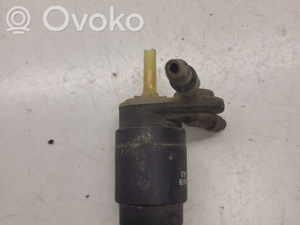Nissan Primera Pompa spryskiwacza szyby przedniej / czołowej 